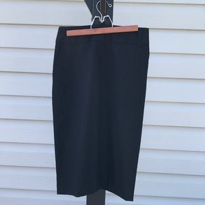 Banana Republic pin black stripped pencil skirt Size 4. Wool spandex blend